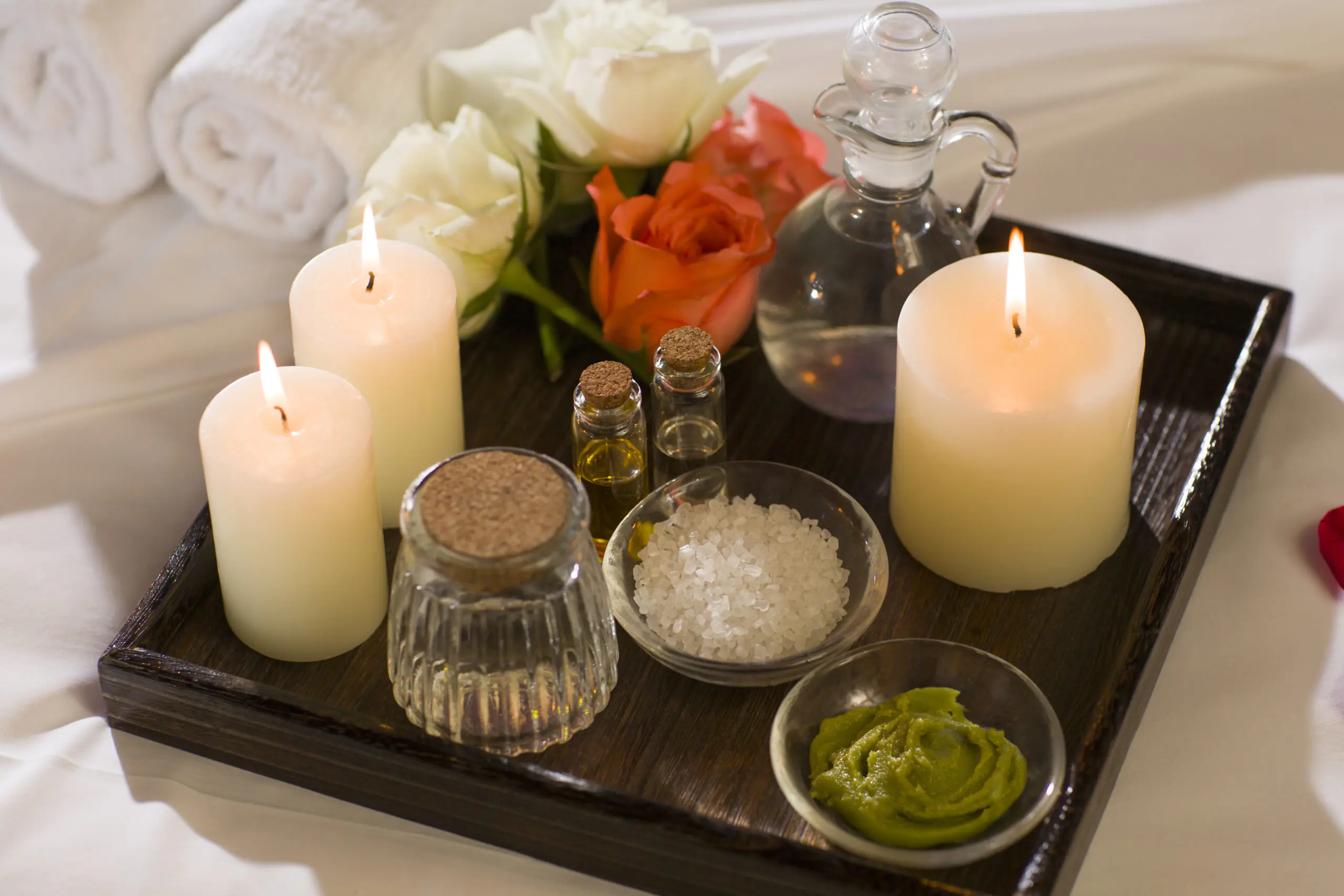 Luxury spa essentials with candles and oils